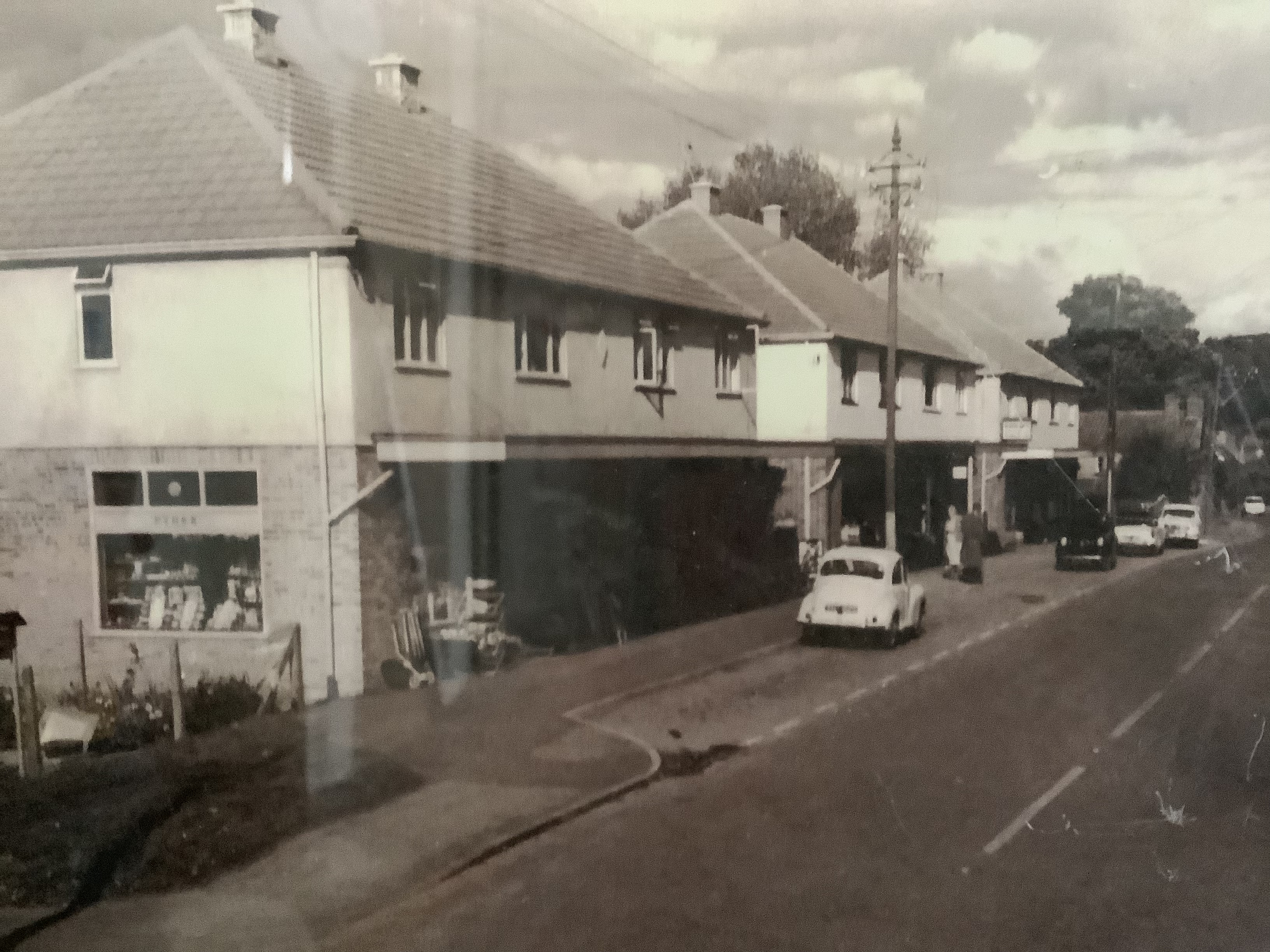 Black and white photograph of the newly built row of shops on Nailsea High Street