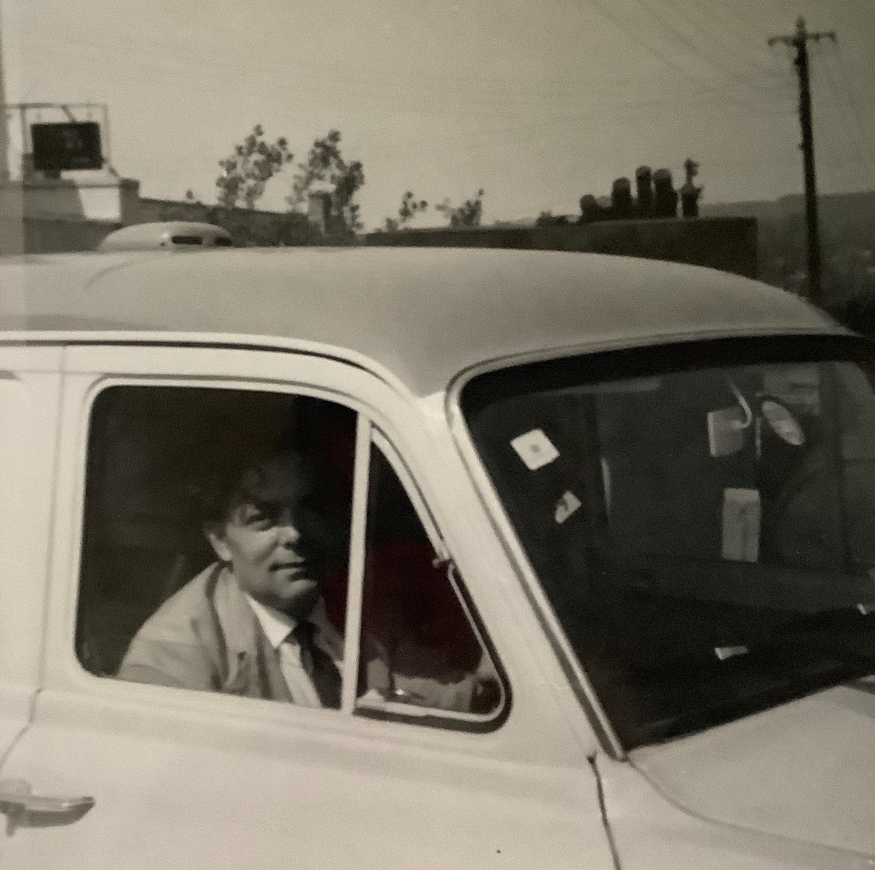 John Brown at the wheel of the shop van
